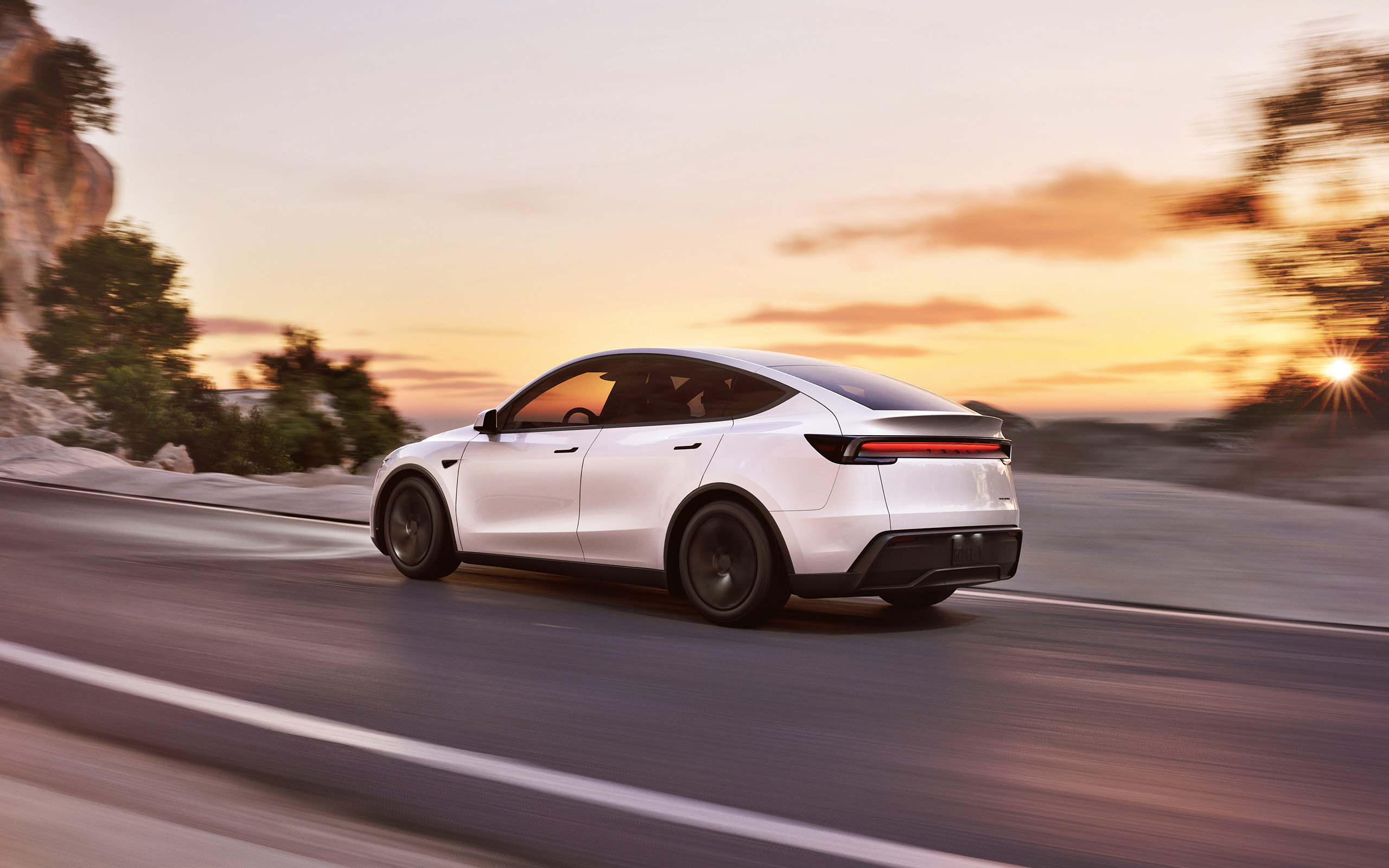  2025 Tesla Model Y Wallpaper.