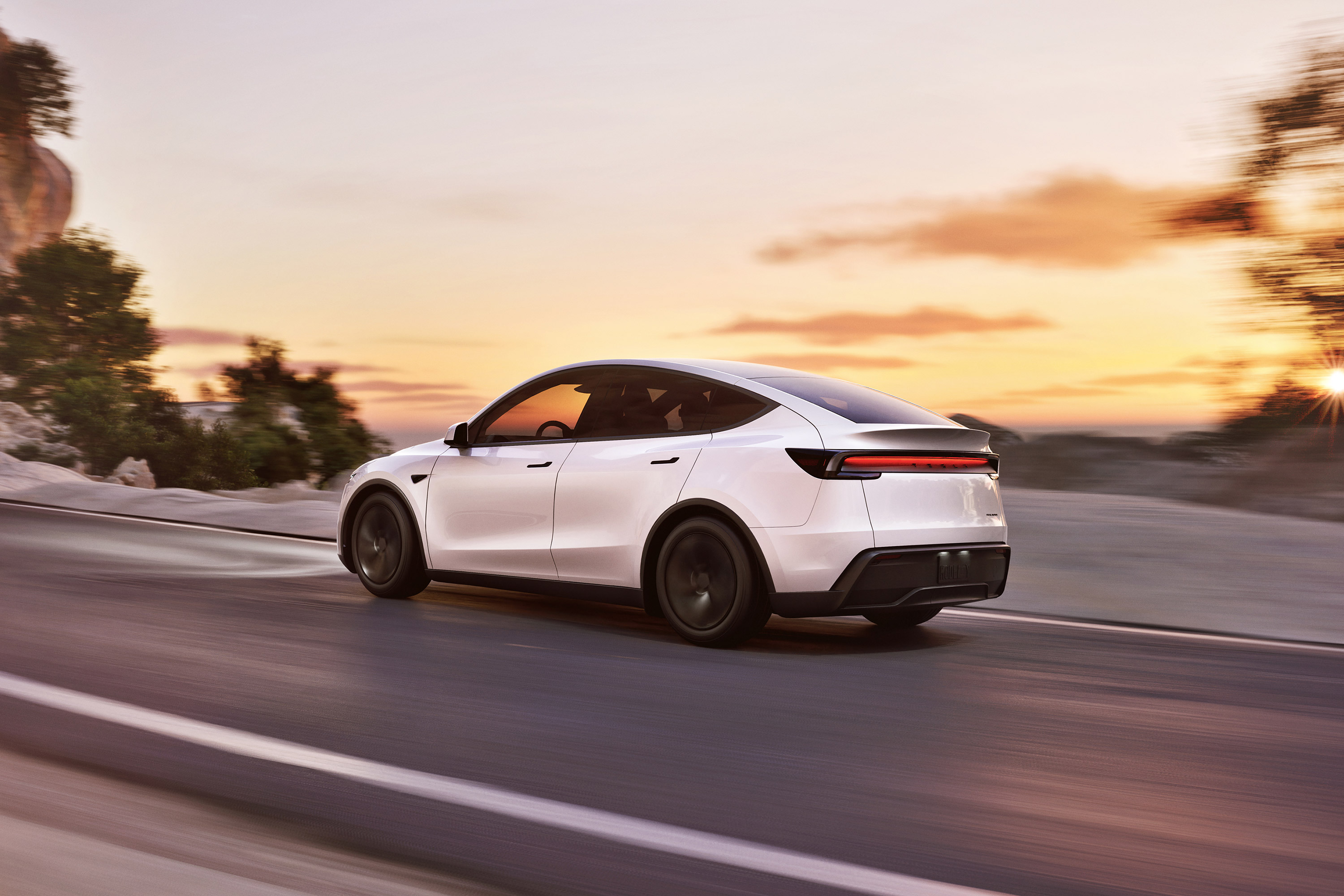  2025 Tesla Model Y Wallpaper.