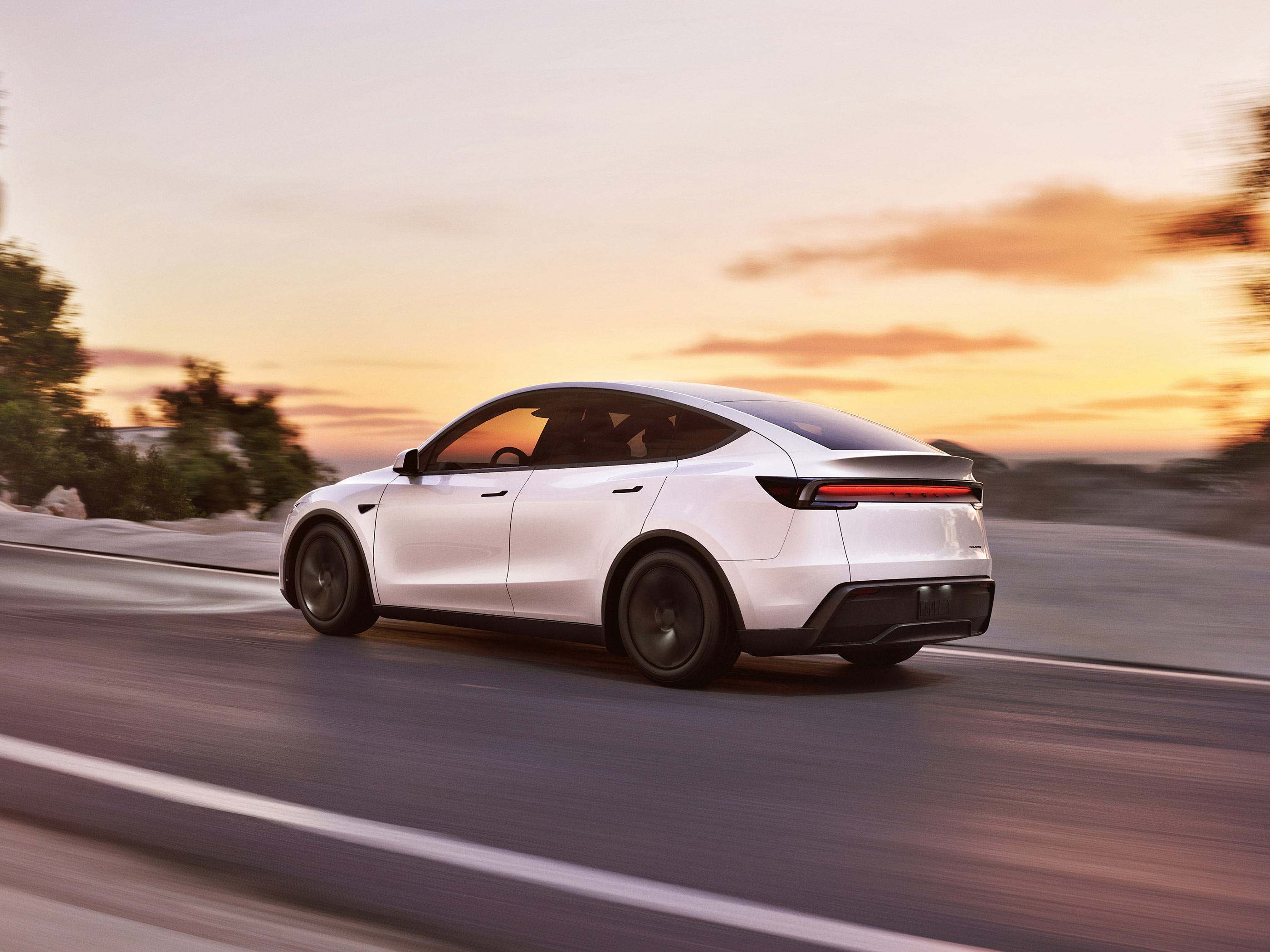  2025 Tesla Model Y Wallpaper.