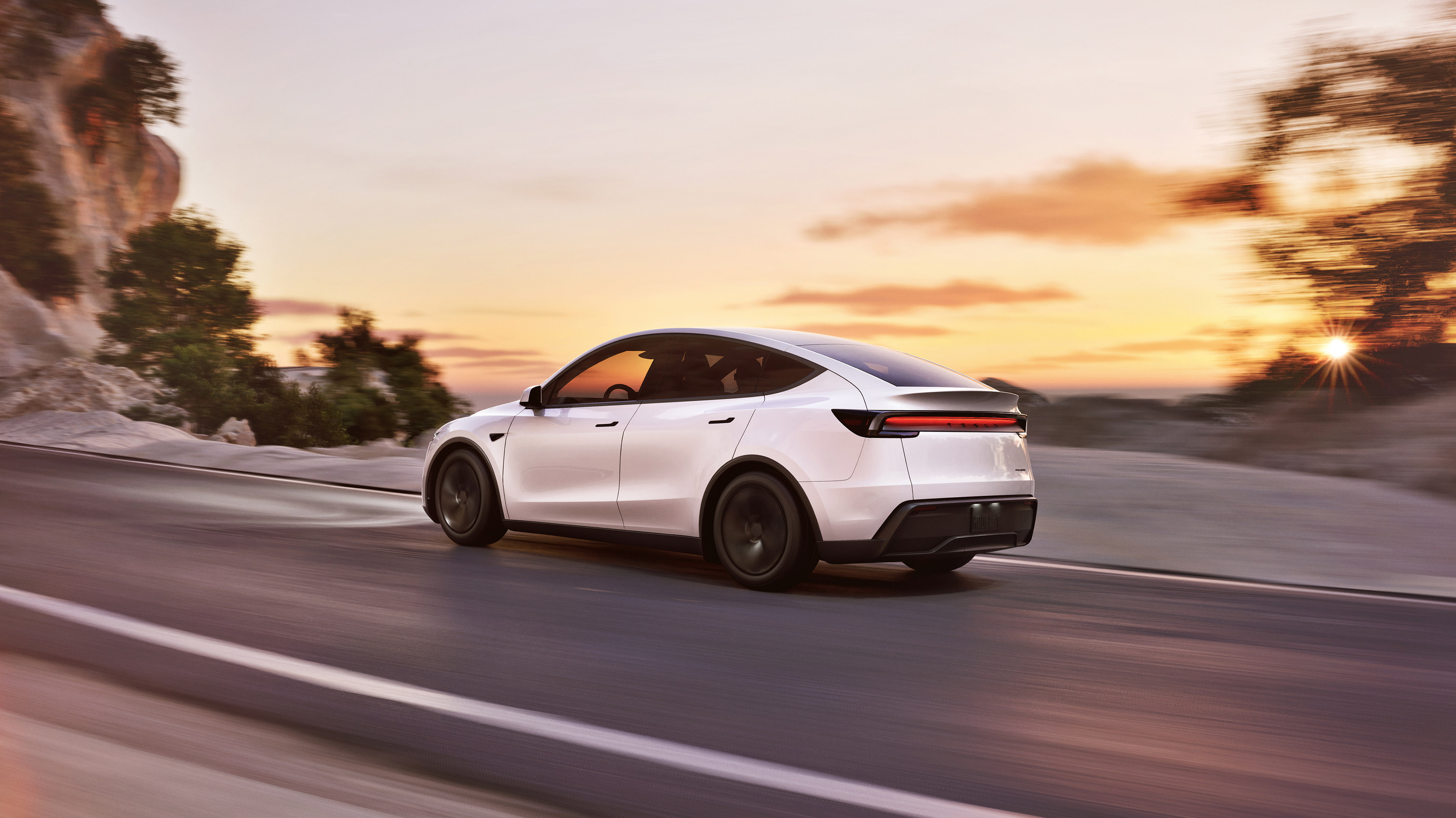  2025 Tesla Model Y Wallpaper.